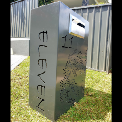 Wide Form Letterbox with Autumn Tree Pattern at Night