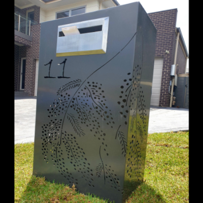 Wide Form Letterbox with Autumn Tree Pattern at Night