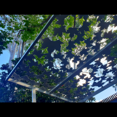 Pergola with Autumn Leaf Pattern in White Powder Coated Aluminium