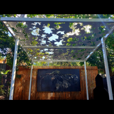 Pergola with Autumn Leaf Pattern in White Powder Coated Aluminium