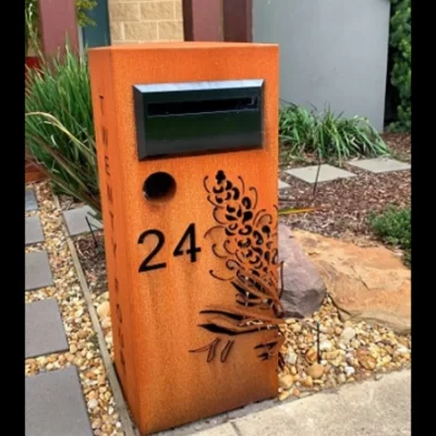 3D Grevillea Letterbox in Rusted Steel - Black Chute