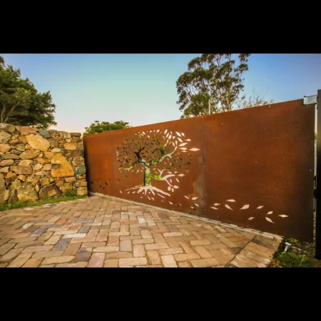 Automated Sliding Gate in Corten Steel with Tree of Life Pattern