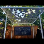 Pergola with Autumn Leaf Pattern in White Powder Coated Aluminium